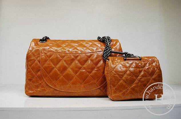 Chanel 35954 replica handbag Tan oil leather with silver hardware