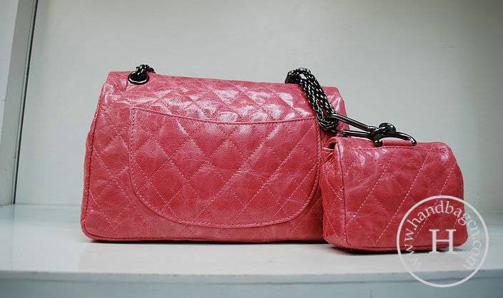 Chanel 35954 replica handbag Pink oil leather with silver hardware