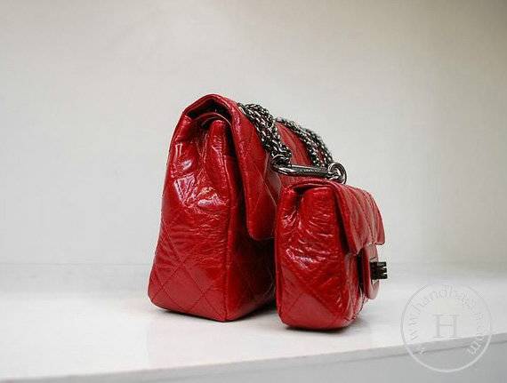 Chanel 35954 replica handbag Red oil leather with silver hardware