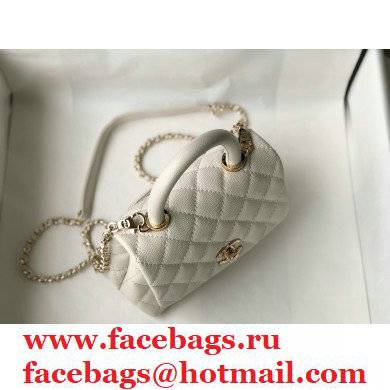 Chanel coco handle Mini Flap Bag in caviar leather white with gold hardware 2021