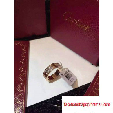 Cartier aurous gold love ring with diamonds