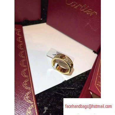 Cartier aurous gold love ring with diamonds