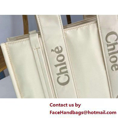 chloe medium Woody tote bag in Recycled nylon with Chloe logo white 2025 chloe medium Woody tote bag in Recycled nylon with Chloe logo white 2025