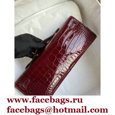 Hermes burgundy Kelly Cut 31cm porosus shiny Leather Clutch Gold/Silver Hardware